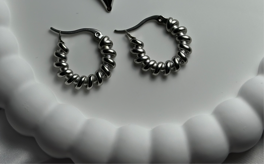 Oorbellen - gedraaide hoops zilver