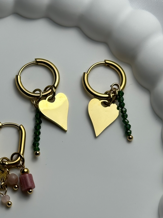 Oorbellen - charming hearts goud